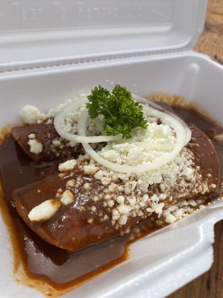 Mole enchiladas from one of our favorite dog-friendly Mexican food trucks